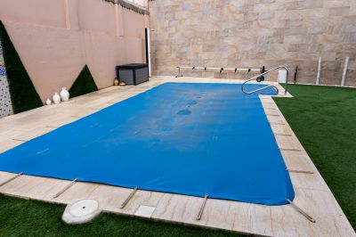 Large Shade Sail Covering a Pool Area