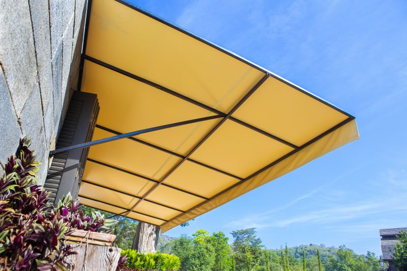 Shade Sail Installation in a Garden